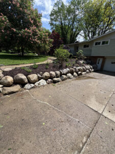 Boulder retaining wall